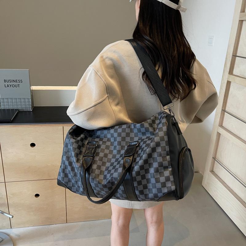 Borsone PU a quadri borsa da viaggio di alta gamma portatile impermeabile leggera grande capacità borsa da cabina