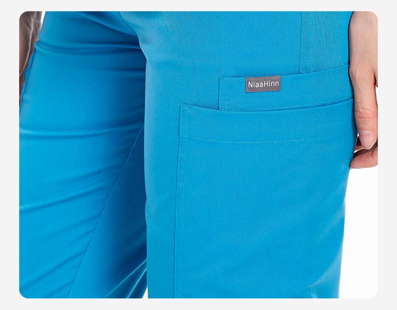 Three-Piece Nurse Scrub Set: V-Neck Jacket, Short-Sleeved Top, Long Pants with Elastic Waist.