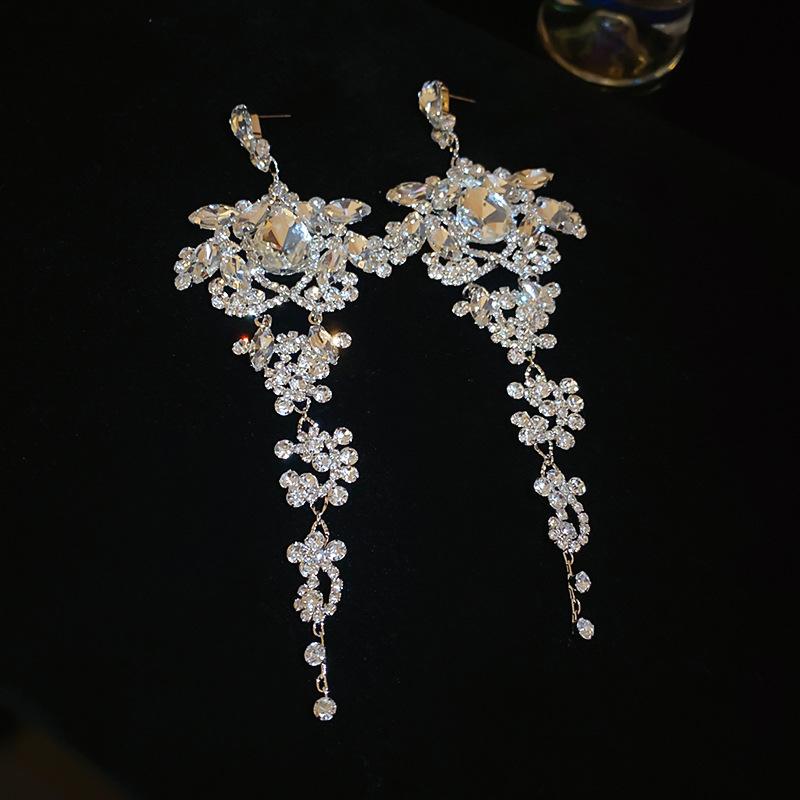 

Elegant Silver Needle Diamond Embedded Waterdrop Tassel Earrings Fashionable Personality Hoop Earrings Luxury Sensation