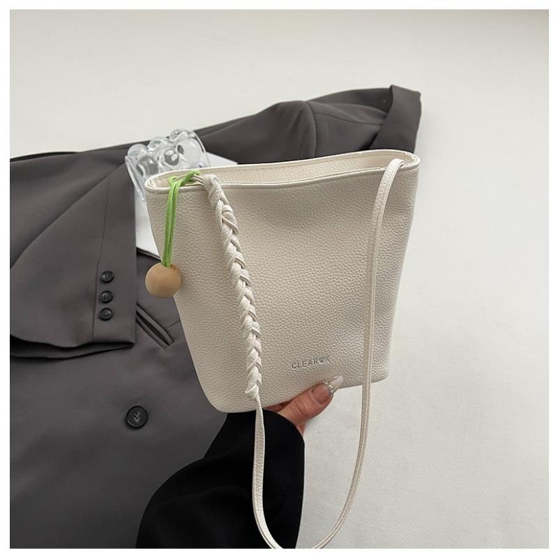 New large-capacity sense retro versatile bucket bag women's fashion shoulder work commuter messenger bag bag