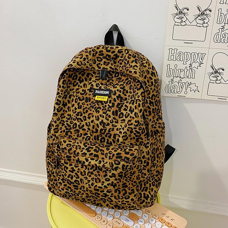 Skolesekk dobbel ryggsekk leopardmønster skolesekk kvinnelig student nytt trendy merke nisjeryggsekk mannlig ungdomsskole ryggsekk engros