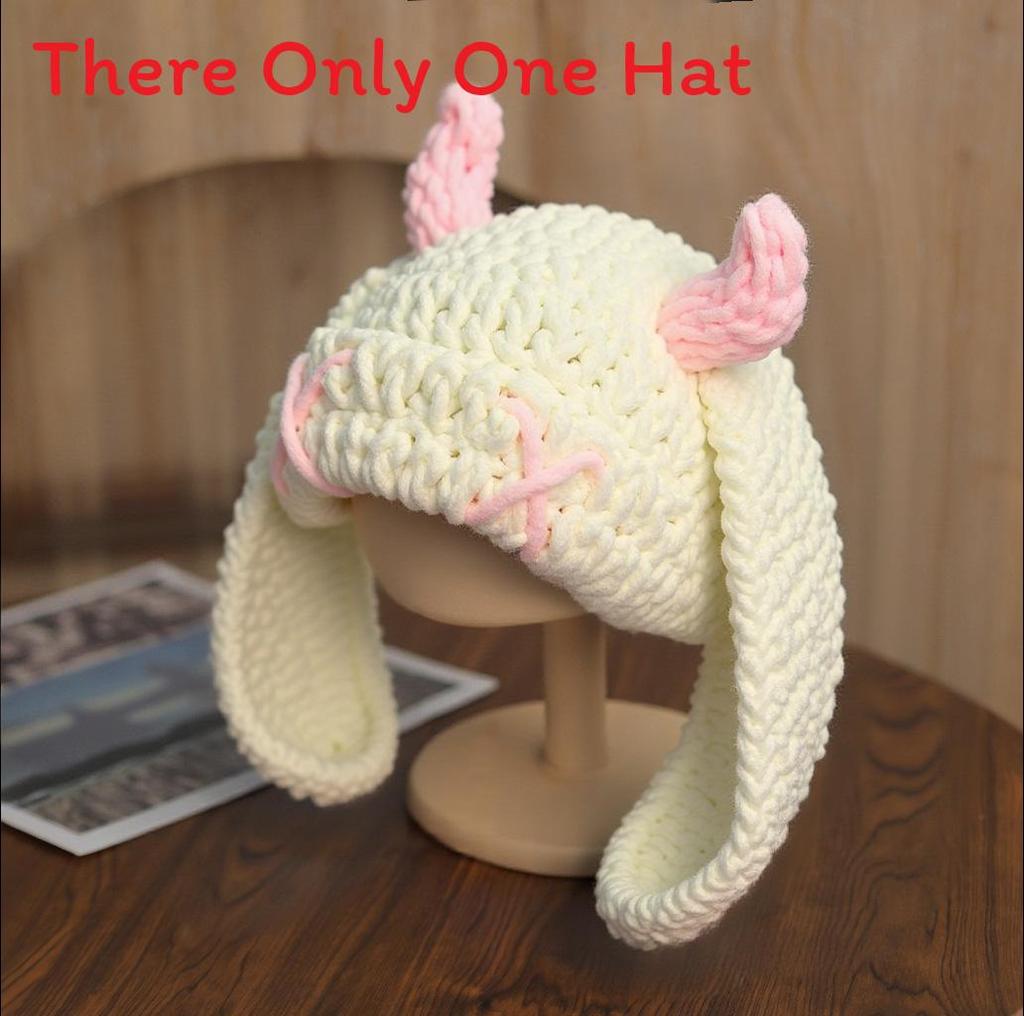 

Knitted Demon Horn Beanie With Ear Flaps For Winter Warmth And Style Beige