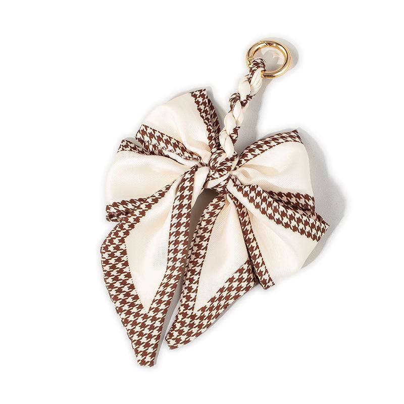 Luxury Bow Chain Bag Charm: Trendy Crossbody Strap and Elegant Pendant Accessory for Influencers
