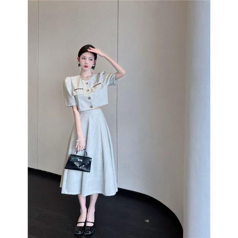 

2026 Summer Fashion: Women s Chic Fragrance Style Two-Piece Set with Short Jacket & Skirt Medium
