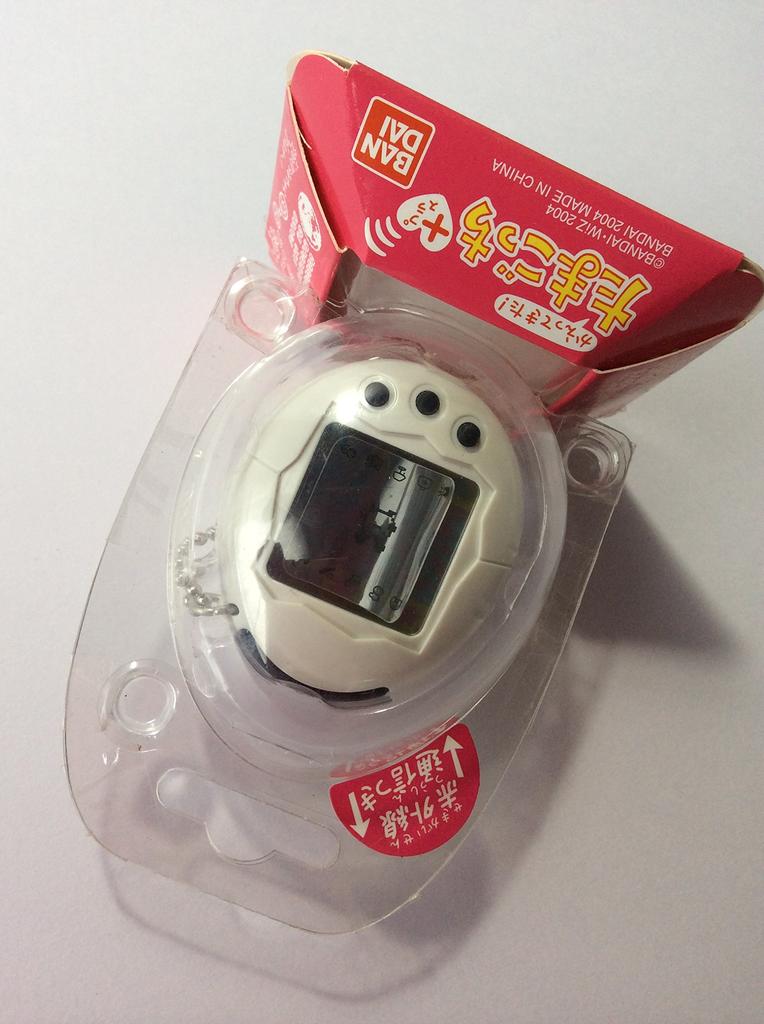Tamagotchi Plus White Black Button Is Back