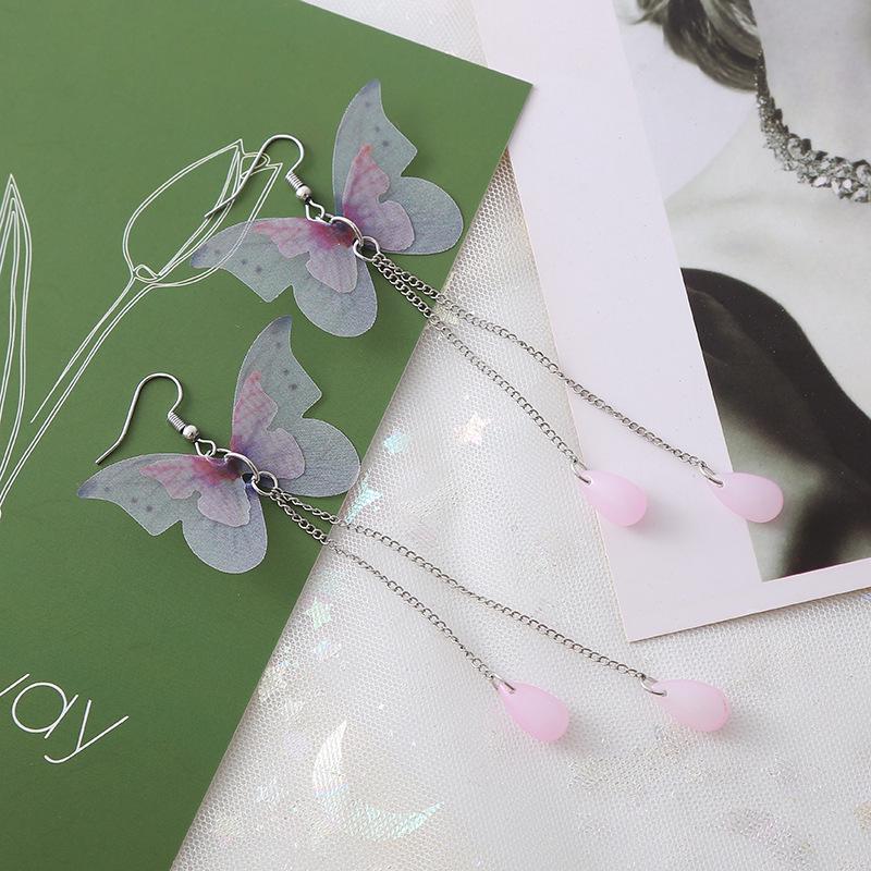 Purple Tassel Butterfly Pearl Earrings: Bold and Elegant Design