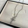 Retro snake-shaped cross pendant necklace, European and American fashion long collarbone chain, niche personalized design item