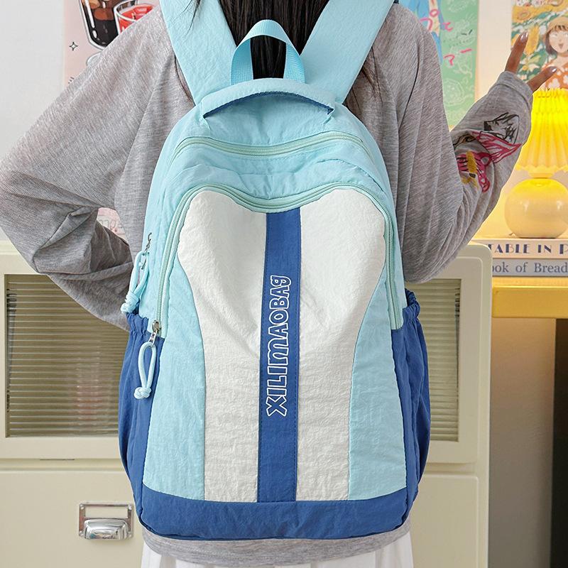 New small fresh and fashionable backpack simple youth campus junior high school student schoolbag large capacity travel backpack