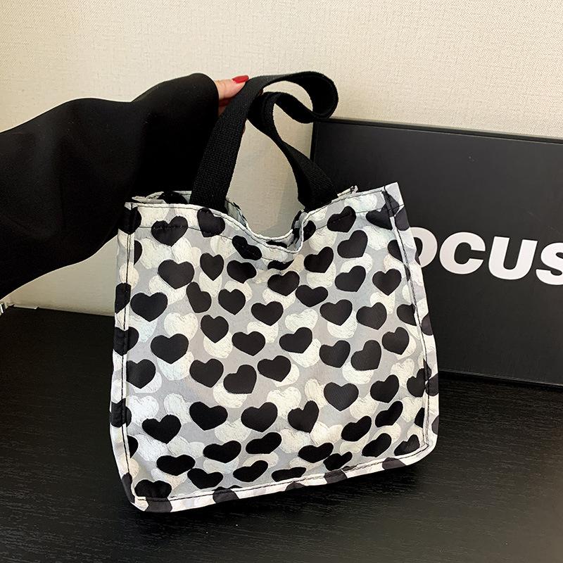 Large-capacity bag women's 2025 spring and summer new cute versatile shoulder bag love portable commuter tote bag