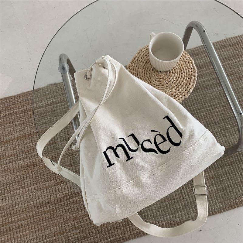 Korean Version New Backpack with Simple Letter Printed Canvas Bag Portable Large Capacity Shopping Bag Student Bucket Bag белый 2760₽