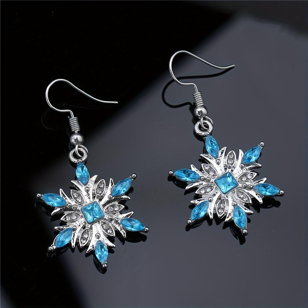 

Minimalist Snowflake Earrings & Necklace Set – Modern Travel Souvenir