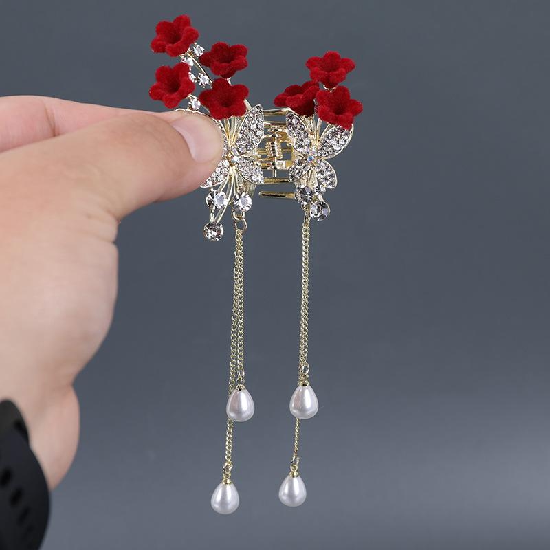 

Рукоятка с кисточкой из розового металла в виде бабочки с ромбовидной кисточкой