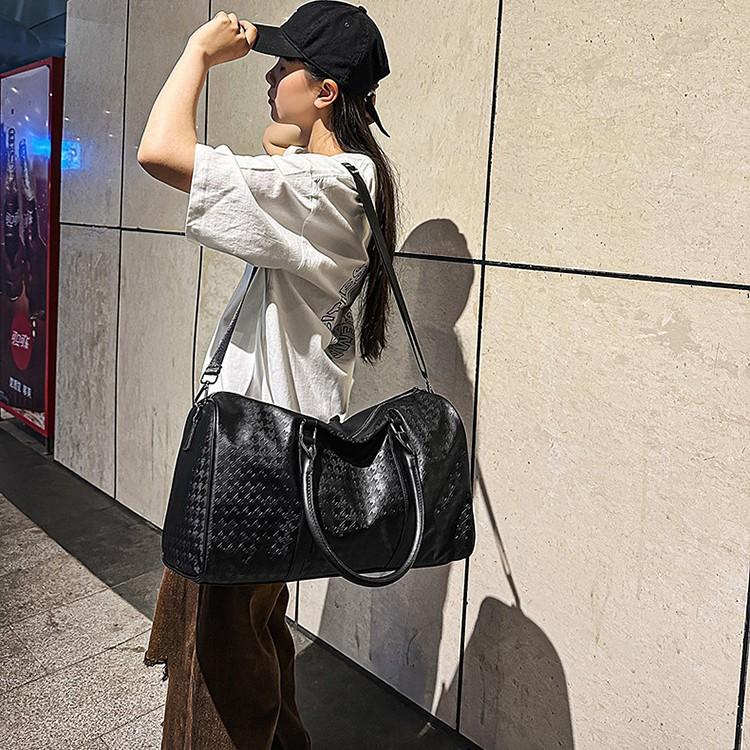 Spring and summer new niche shoulder travel bag large capacity men's and women's tote bag portable pu bag