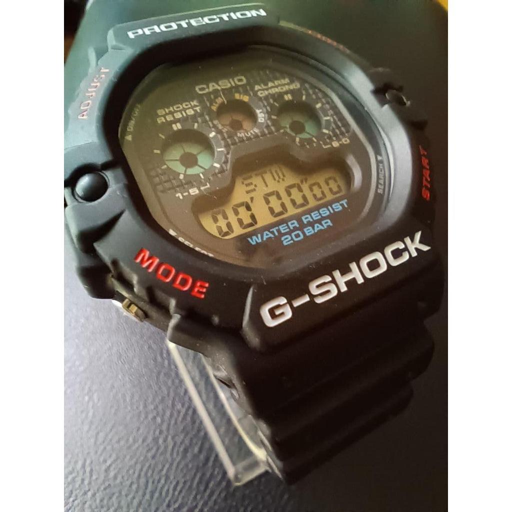 Used CASIO G-SHOCK digital watch DW5900 commonly known as the third eye reprint edition