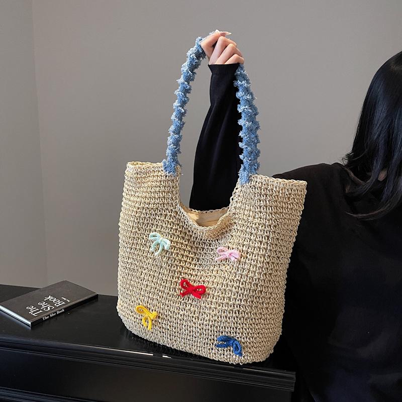 Hand-woven portable basket woven bag cartoon multicolored bow wind shoulder portable tote bag