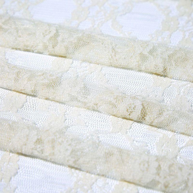 Embroidered lace fabric with hollowed-out patterns can be used for wedding dresses evening gowns and designer clothing fabrics