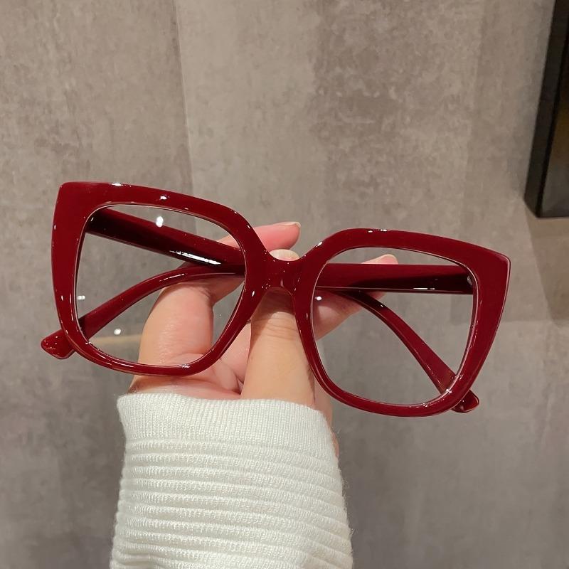 Klassiska och moderiktiga enfärgade dekorativa glasögon för kvinnor, klassisk design, bekväma att bära för yrkesverksamma på arbetsplatsen.