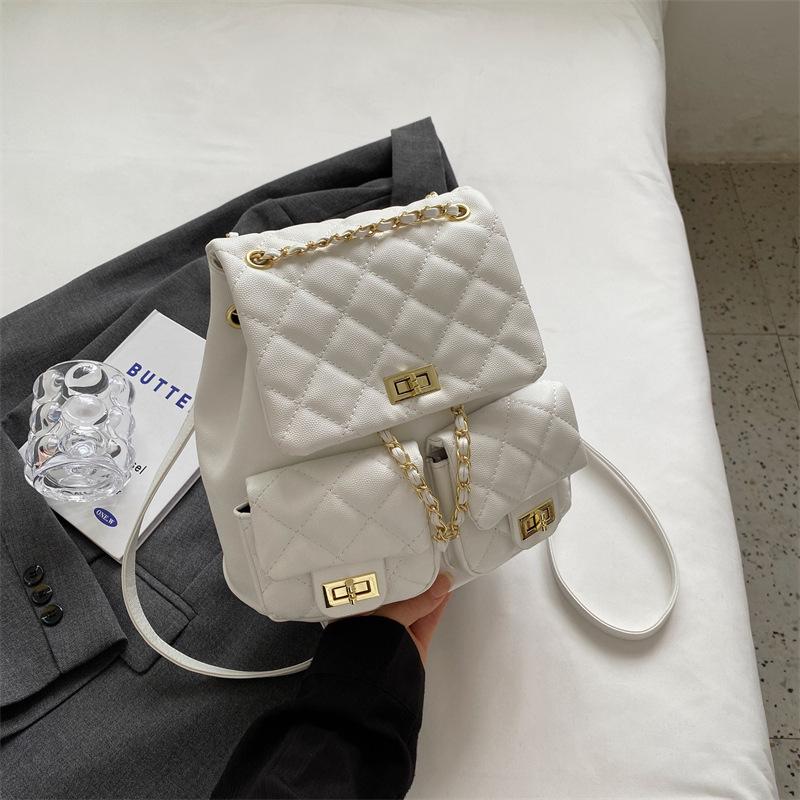 

Популярная в этом году сумка для поездок на работу женская 2025 новая модная вместительная сумка-рюкзак с ромбовидной цепочкой студенческий рюкзак