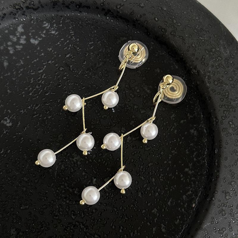 Korean Style Retro Pearl Ear Clip for Women - Mosquito Coil Holder, No Piercing, High-End, Fashionable and Versatile Luxury Earrings