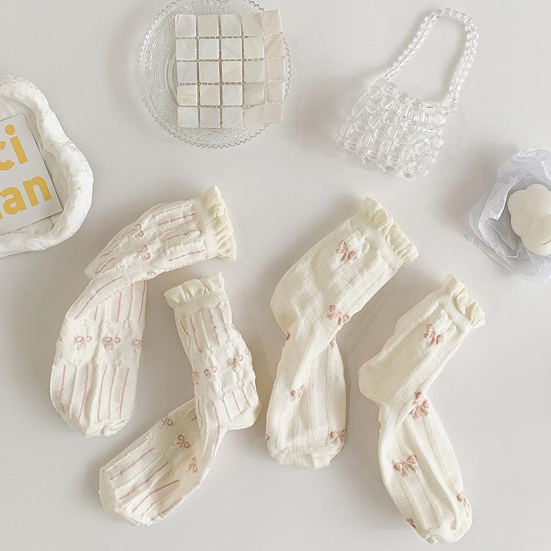 Chaussettes blanches simples, polyvalentes, jolies, nœuds papillon, petites fleurs, chaussettes tube moyennes pour femmes, Kawaii Harajuku Jk Lolita, chaussettes en coton pour filles