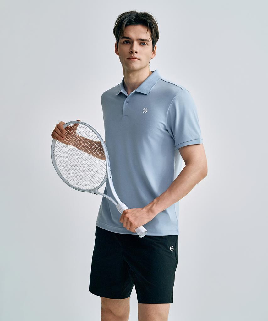 SERGIO TACCHINI M Playing Polo