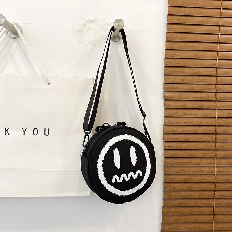 Trendy And Stylish Black Oxford Fabric Round Bag For Women With Soft Shoulder Strap