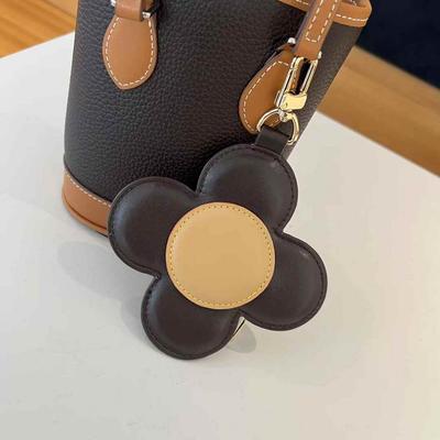 2025 New Leather Pendant Leather Mini Earphone Bag Sunflower Color Blocked Pendant Wallet Cross Border Batch