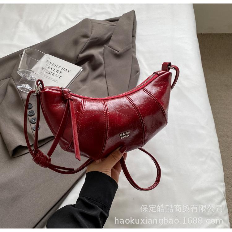 

Silver bag women s 2025 new fashion dumpling bag crescent moon messenger bag niche high-end shoulder bag croissant bag бордовый