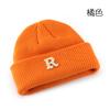 Women's Solid Color Letter Print R Rolled brim knitted hat for outdoor cycling, providing warmth, cold protection, and ear coverage