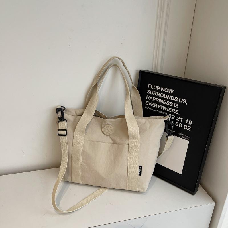 Simple literary cloth bag, women's work portable shoulder bag, large-capacity casual messenger tote bag