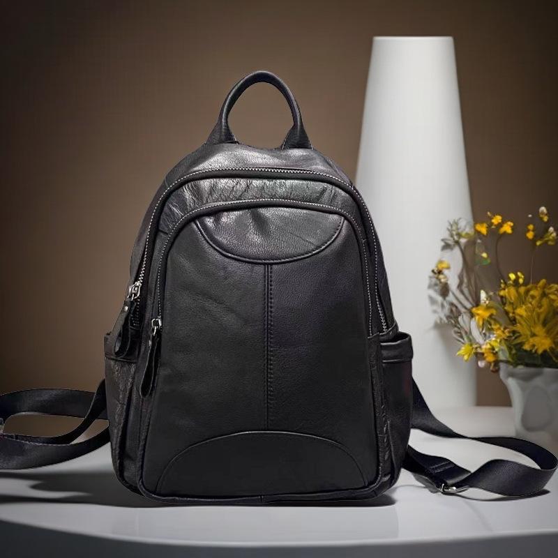 Mochila de couro feminina preta primeira camada de couro de vaca mochila feminina moda moderna versátil bolsa feminina de couro macio