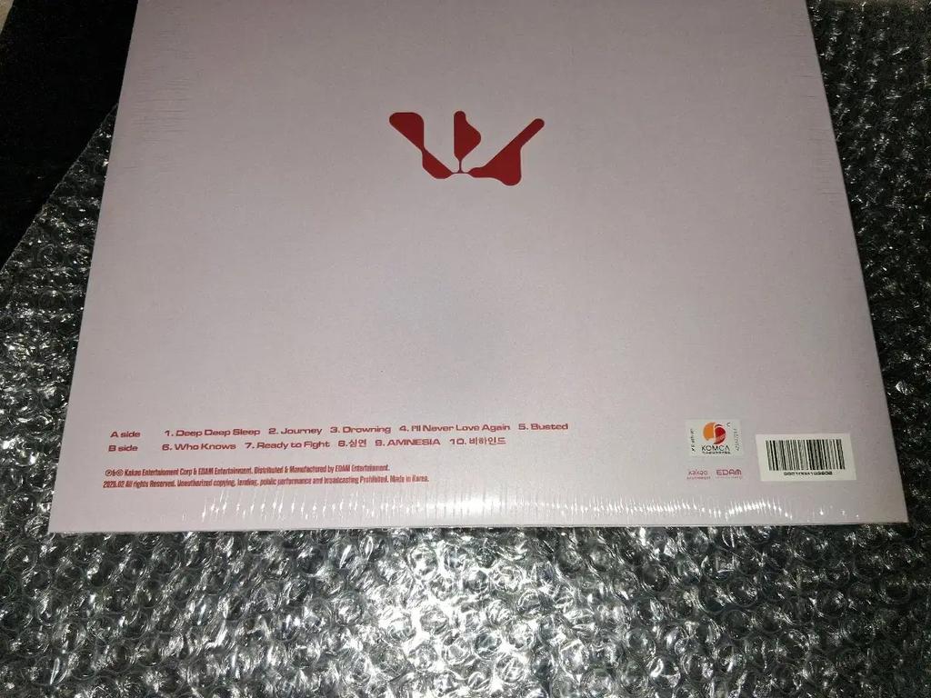 Woodz Cho Seung-yeon LP, neotevřené, zapečetěné, s bonusovými předměty.