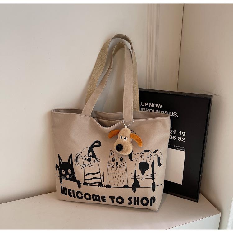 Casual large-capacity canvas bag women's new lightweight and versatile commuter shoulder bag portable tote bag