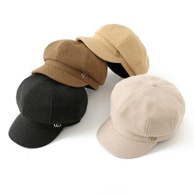Koreanische Version Herbst und Winter Neuer Hut für Damen Mode Vielseitig Metallisches Logo Britischer Stil Baseballkappe Retro Literarische Achteckmütze Trend
