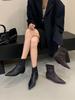 2025 autumn and winter new pointed-toed woven loose sleeve wedge short boots women's inner height-increasing and medium boots