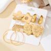 A set of four pairs of golden yellow glossy earrings, flower love, geometric style, simple, elegant and fashionable