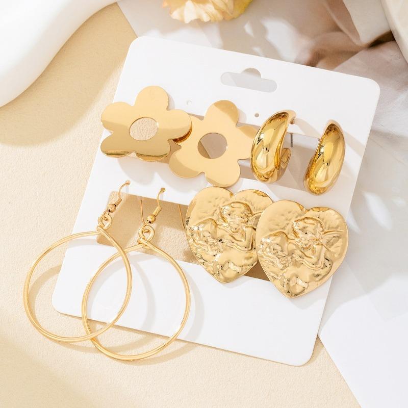 A set of four pairs of golden yellow glossy earrings, flower love, geometric style, simple, elegant and fashionable