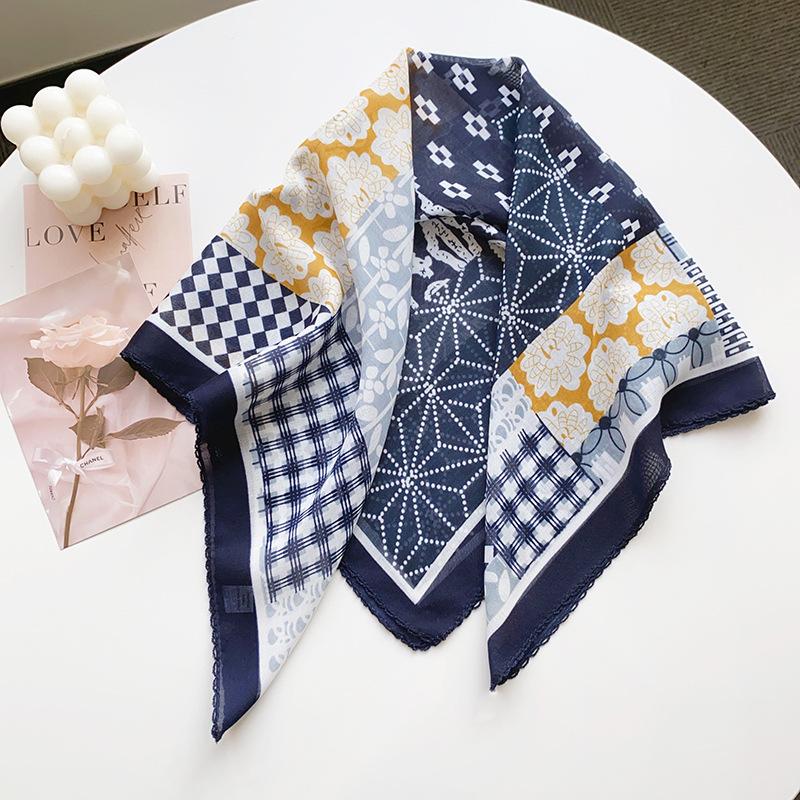 Creative design with a simple color-blocked Bali yarn curved edged square scarf, high-end sun protection, lightweight travel photography paired