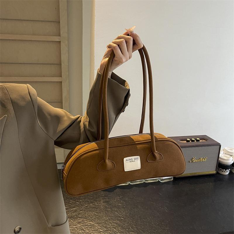 Niche retro matte underarm bag women's new bowling bag simple large-capacity portable commuter women's bag