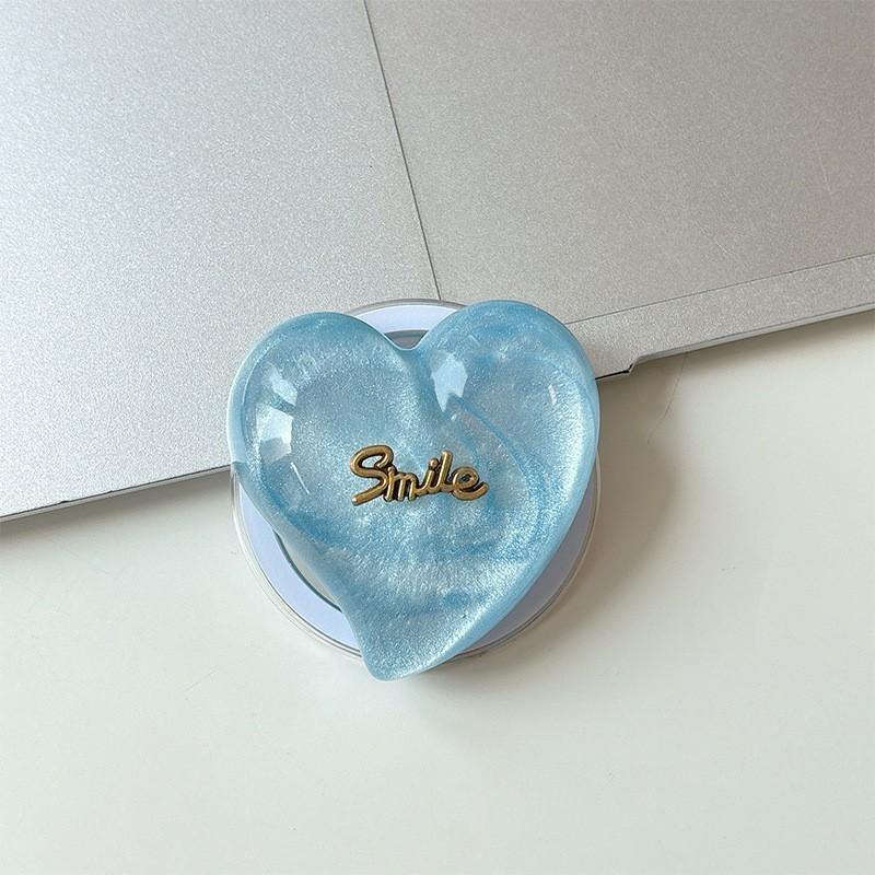

Mobile Airbag Holder Magnetic Suction Magsafe Love Glitter Solid Color Telescopic Desktop Support Lazy People Watching Dramas Wholesale