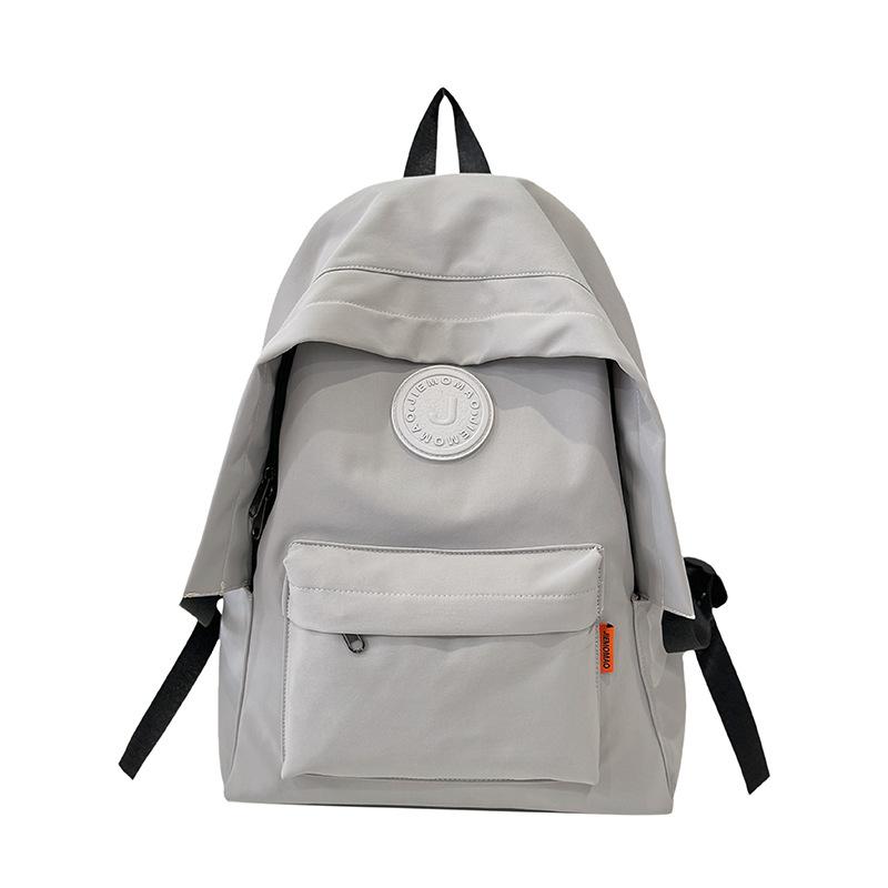 Stylish simple large-capacity couple student schoolbag new junior high school high school student backpack fashion