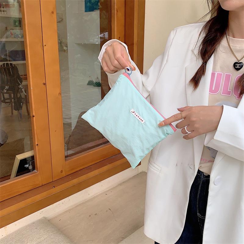 Korean niche design ice cream color cosmetic bag small object storage bag letter clutch bag change bag