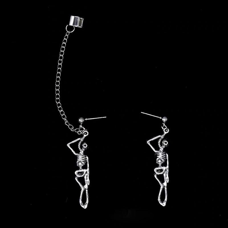 

Серьги в стиле европейского и американского готического панка с черепом — асимметричный дизайн в виде кости, преувеличенный стиль диско-хип-хоп для женщин