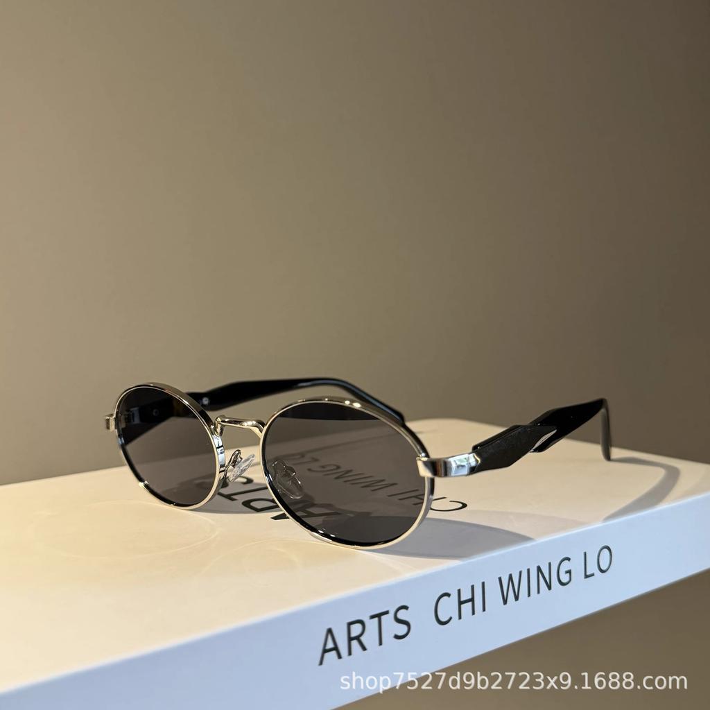New oval metal retro sunglasses for women, high-end brand no-makeup street style European and American sun-protective sunglasses