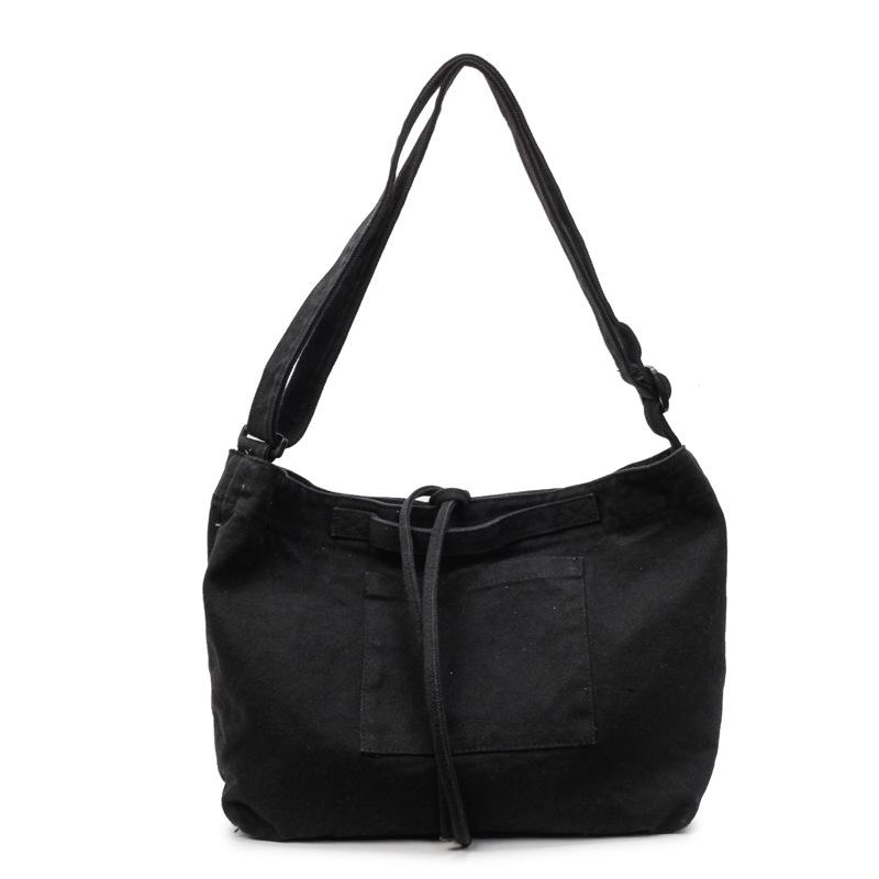 Stylish, simple and large-capacity cloth bag, new solid color shoulder bag, Korean version trendy portable messenger bag.