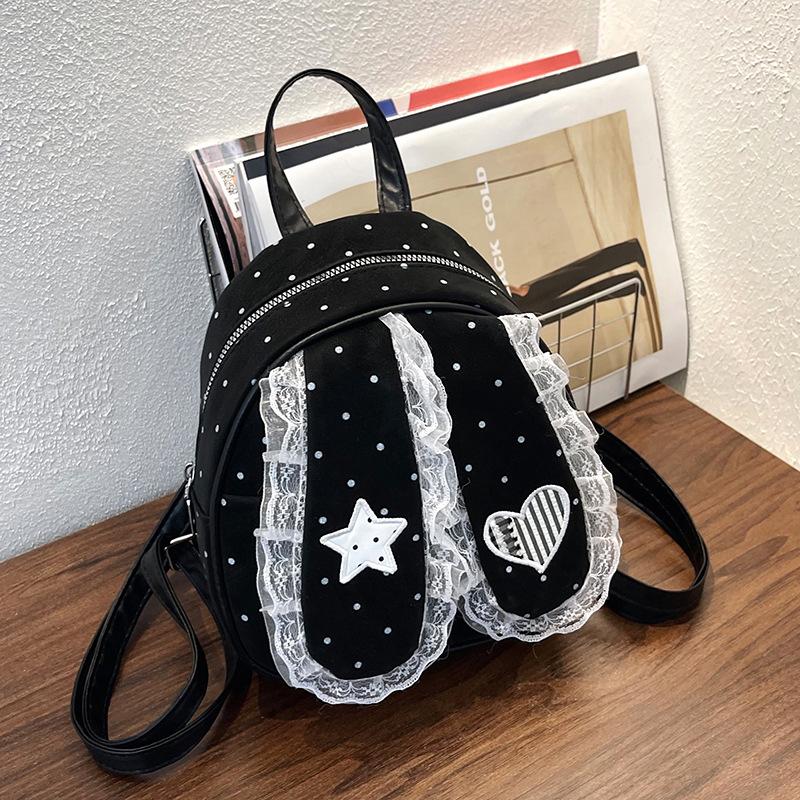 Schoolbag Korean version of sweet lace polka dot lop ear rabbit backpack girly style high value commuting foreign style fashion small backpack