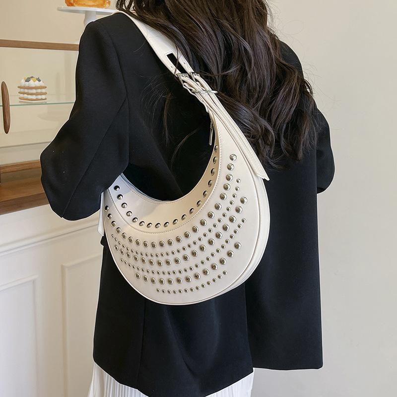 Women's bag 2025 new European and American fashion rivet punk style shoulder bag, large capacity shoulder hand, armpit bag