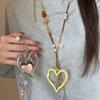 Artistic Gold Tone Heart Ethnic Necklace Long Layering Chain Winter Accessory For Sweaters And Coats Alloy Jewelry
