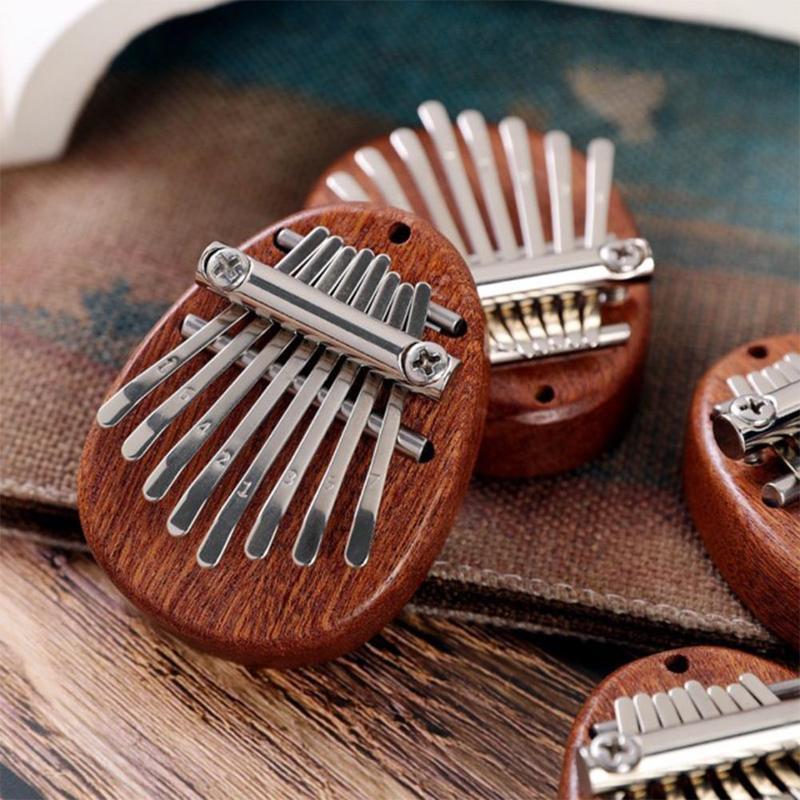 Bærbar Mini Sapele-plate med 8 nøkler Kalimba Nybegynnere Tommel Piano Gave