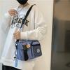 Unisex Plain Color Crossbody Bag, Casual Zipper Shoulder Bag with Astronaut Charm & Random Badge, Versatile Daily Messenger Bag
